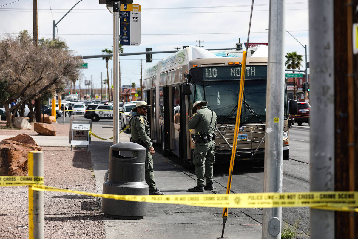 Police at the scene where at least one person was injured after a shooting in central Las Vegas ...