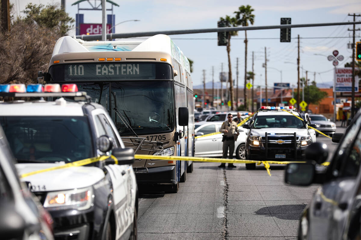 Police at the scene where at least one person was injured after a shooting in central Las Vegas ...