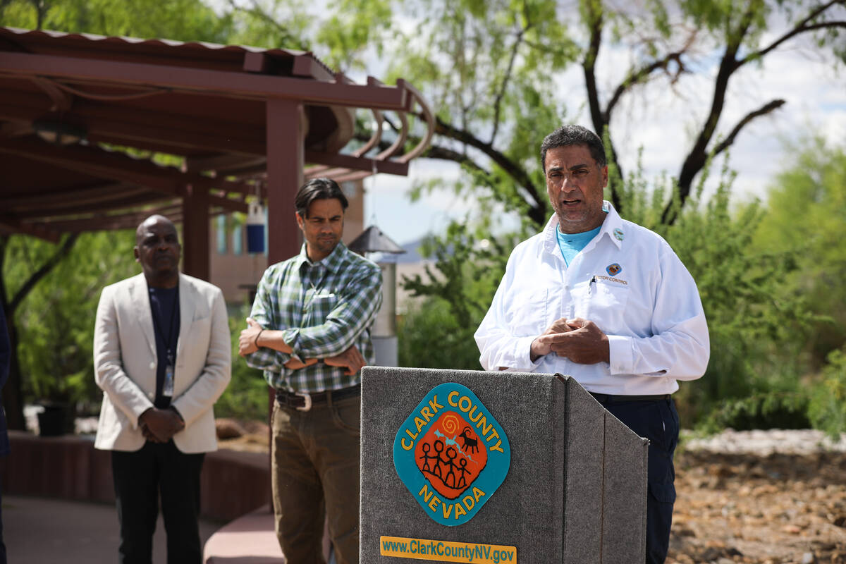 Christopher Bramley, vector control supervisor with the Department of Public Works, addresses m ...