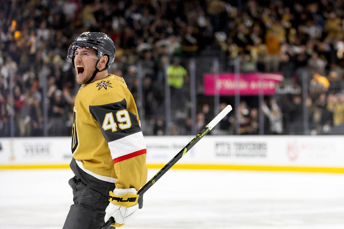 Golden Knights center Ivan Barbashev (49) celebrates after scoring during the first period in G ...