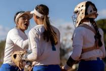 Green Valley’s Liliana Esparza, left, Gabby Machida and Rustie Riley celebrate after win ...