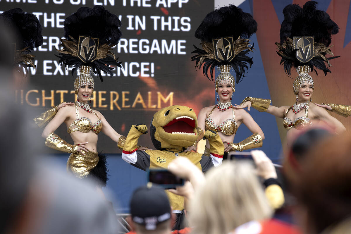 The Vegas Belles perform with Golden Knights mascot Chance before Game 2 of an NHL hockey Stanl ...