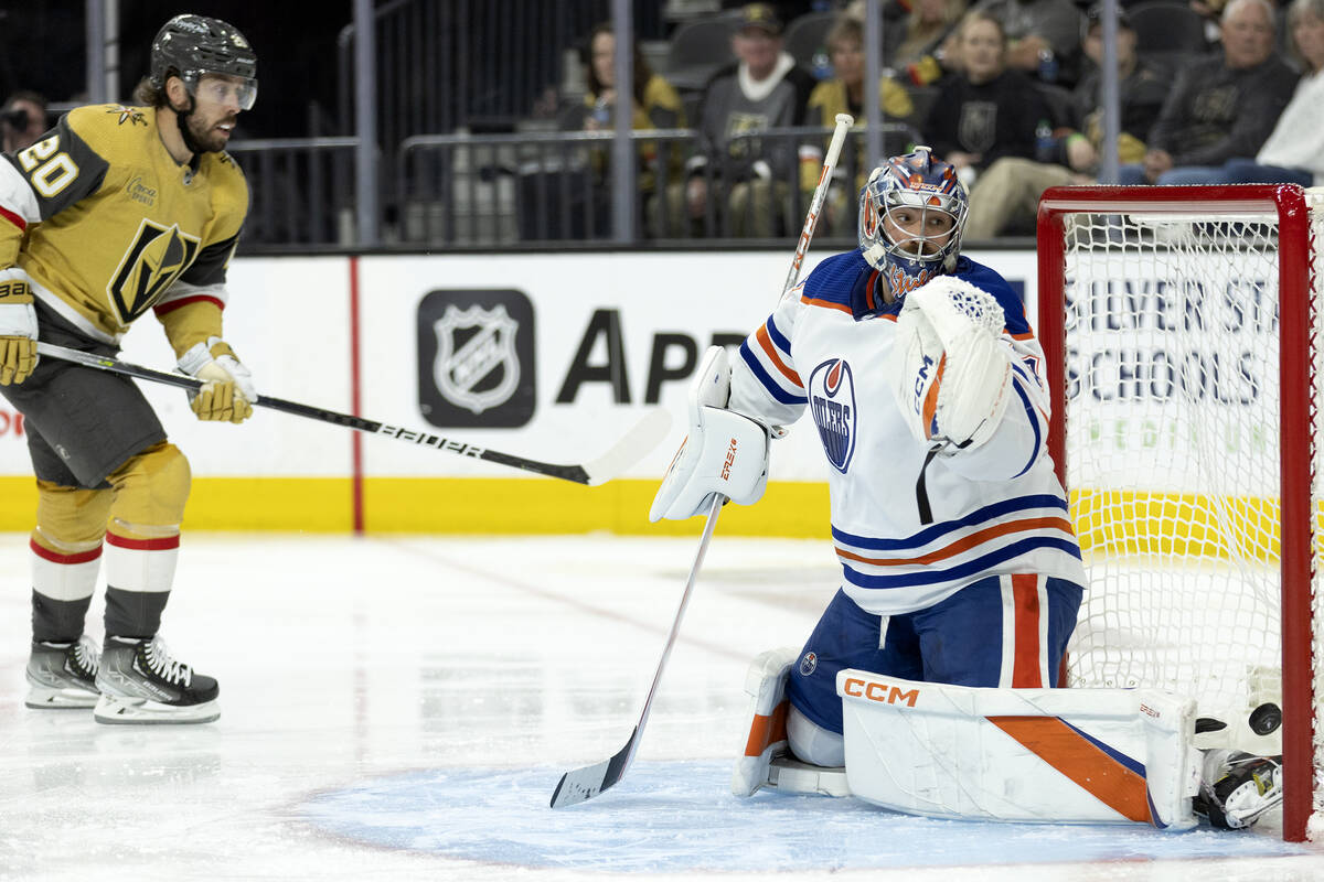 Edmonton Oilers goaltender Stuart Skinner (74) lets a goal in by Golden Knights center Ivan Bar ...