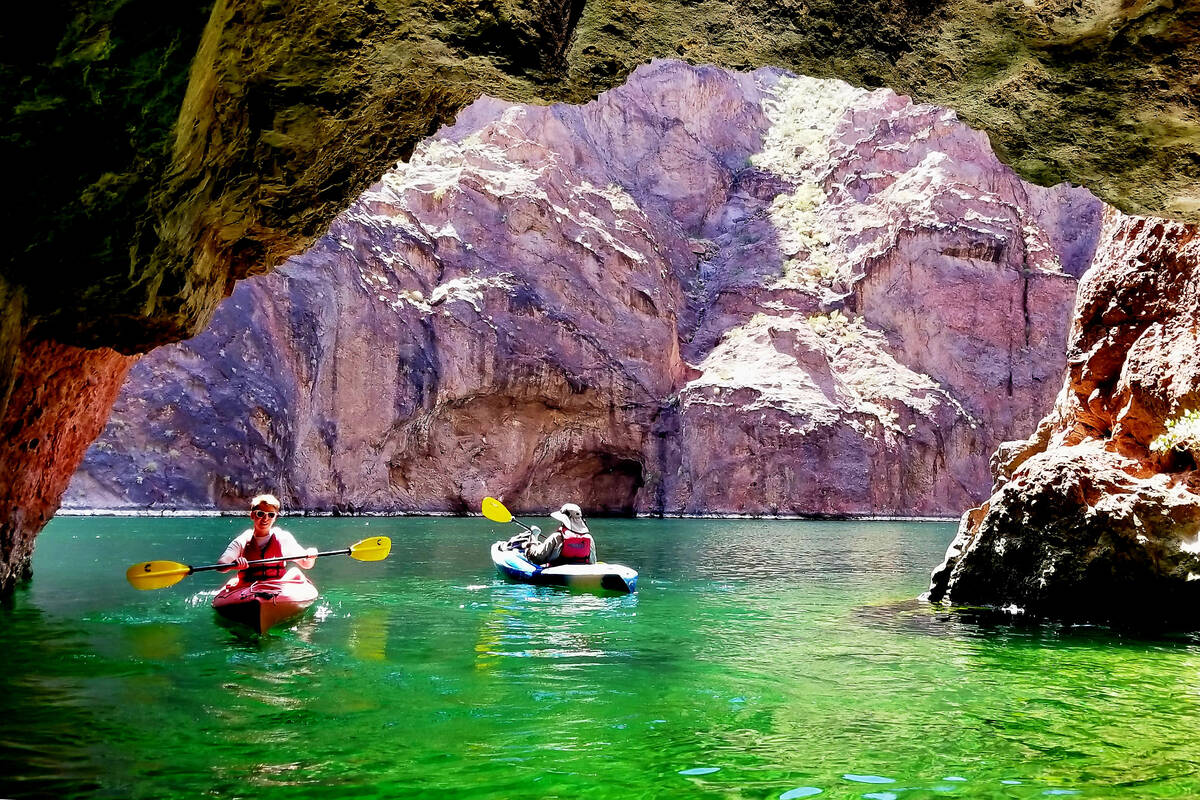 Ryan Burt and Chris Burt kayak at Emerald Cave, about a 2-mile paddle up river from Willow Beac ...