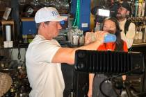 Mark Wahlberg pours Flecha Azul tequila shots during an appearance at On The Border Mexican Gri ...