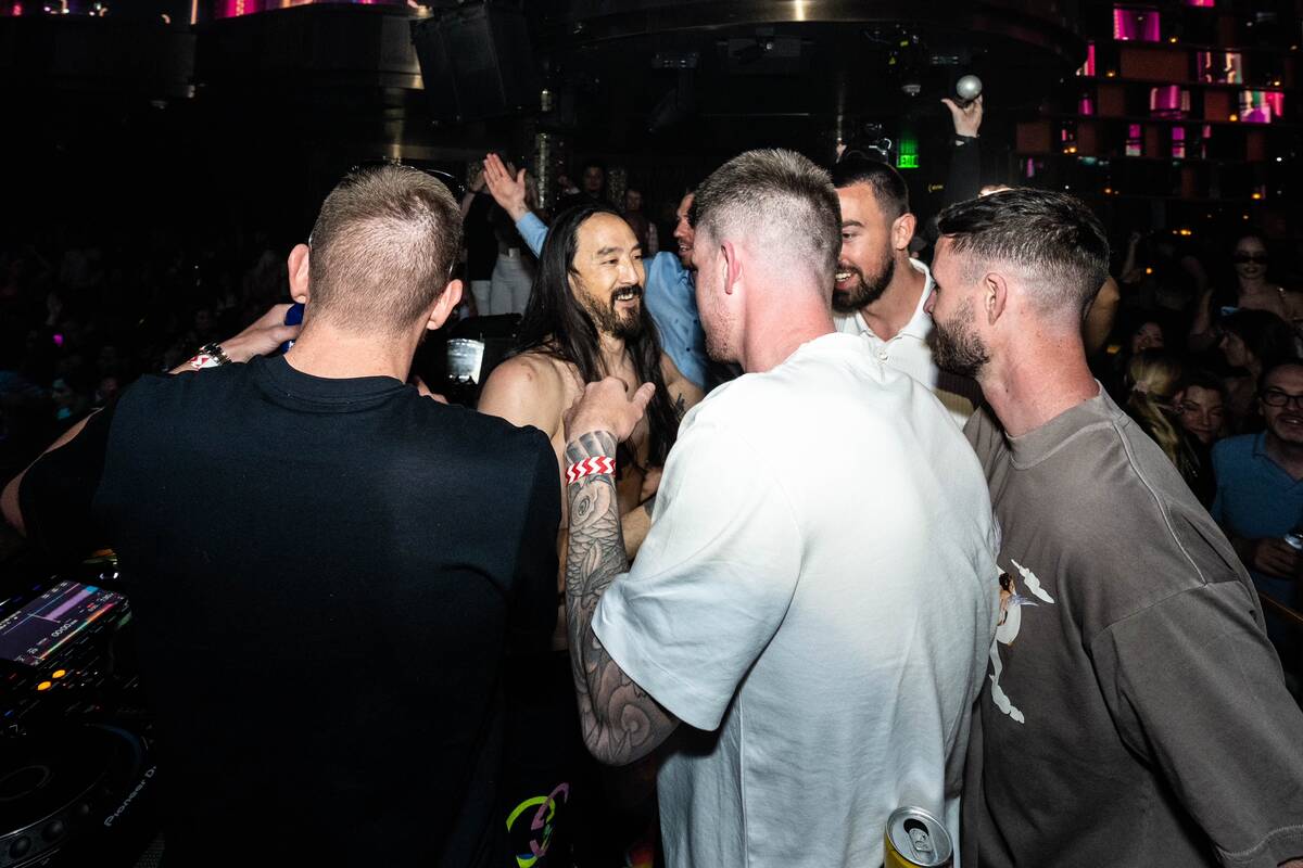 Members of the Wrexham soccer team are shown with superstar DJ Steve Aoki at Omnia Nightclub at ...