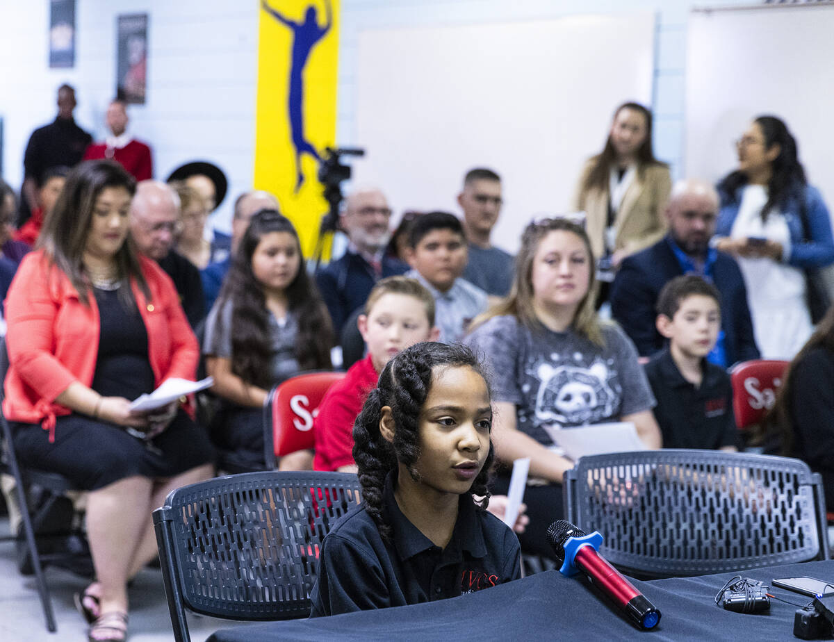 Eden Johnson, a third grade student at Mountain View Christian School, delivers her testimony d ...