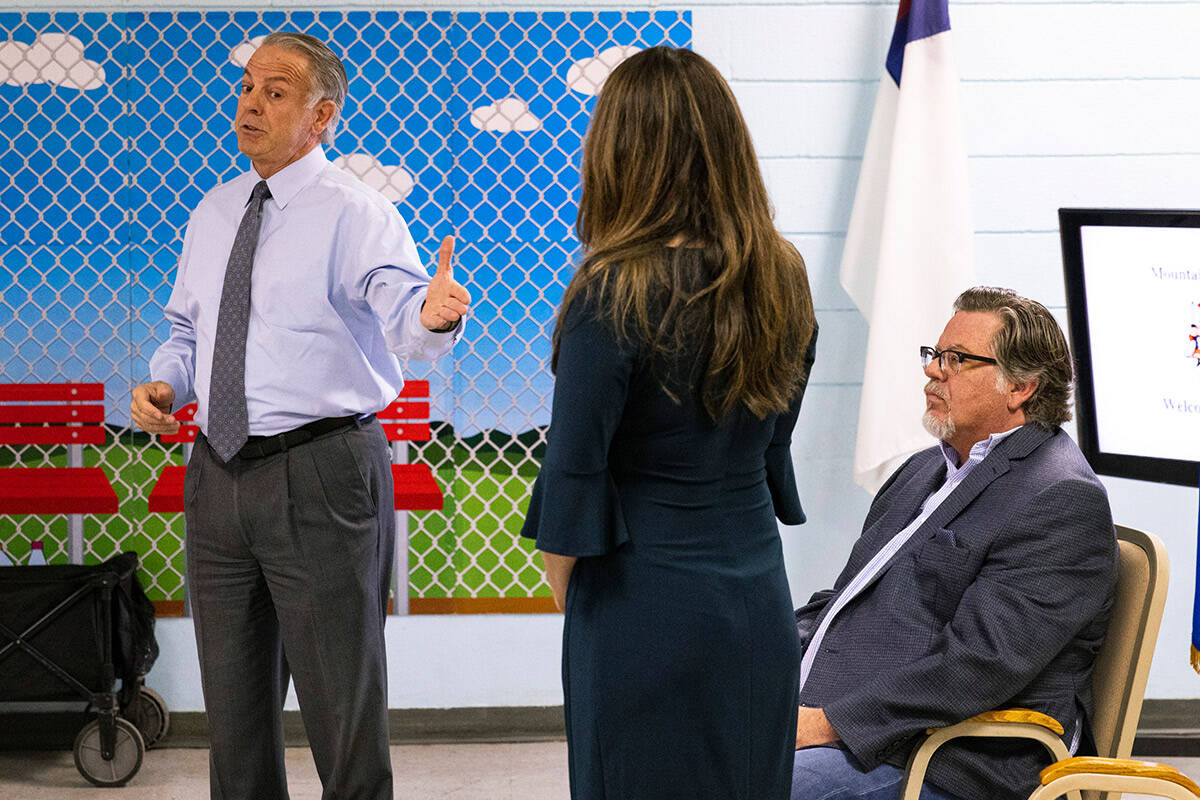 Gov. Joe Lombardo, left, gestures toward Valeria Gurr, Nevada School Choice Coalition, as Raymo ...