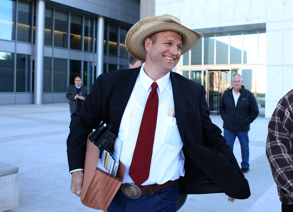 Ammon Bundy leaves the Lloyd George U.S. Courthouse on Monday, Dec. 11, 2017, in Las Vegas. (Bi ...