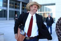 Ammon Bundy leaves the Lloyd George U.S. Courthouse on Monday, Dec. 11, 2017, in Las Vegas. (Bi ...