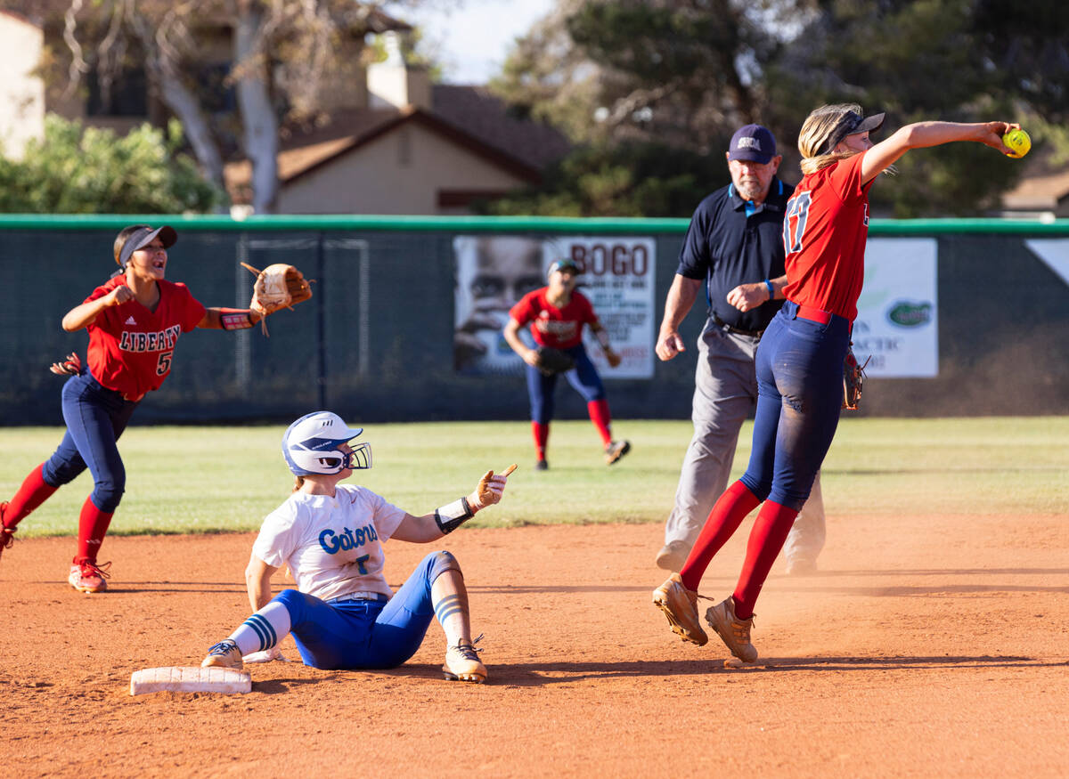 Liberty High's Jesse Farrell (17) and her teammate Jaydah Chun (50) celebrate after Farrell tag ...