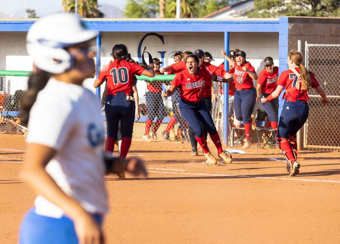 Liberty High School players celebrate their 4-3 win against Green Valley High during the NIAA 5 ...