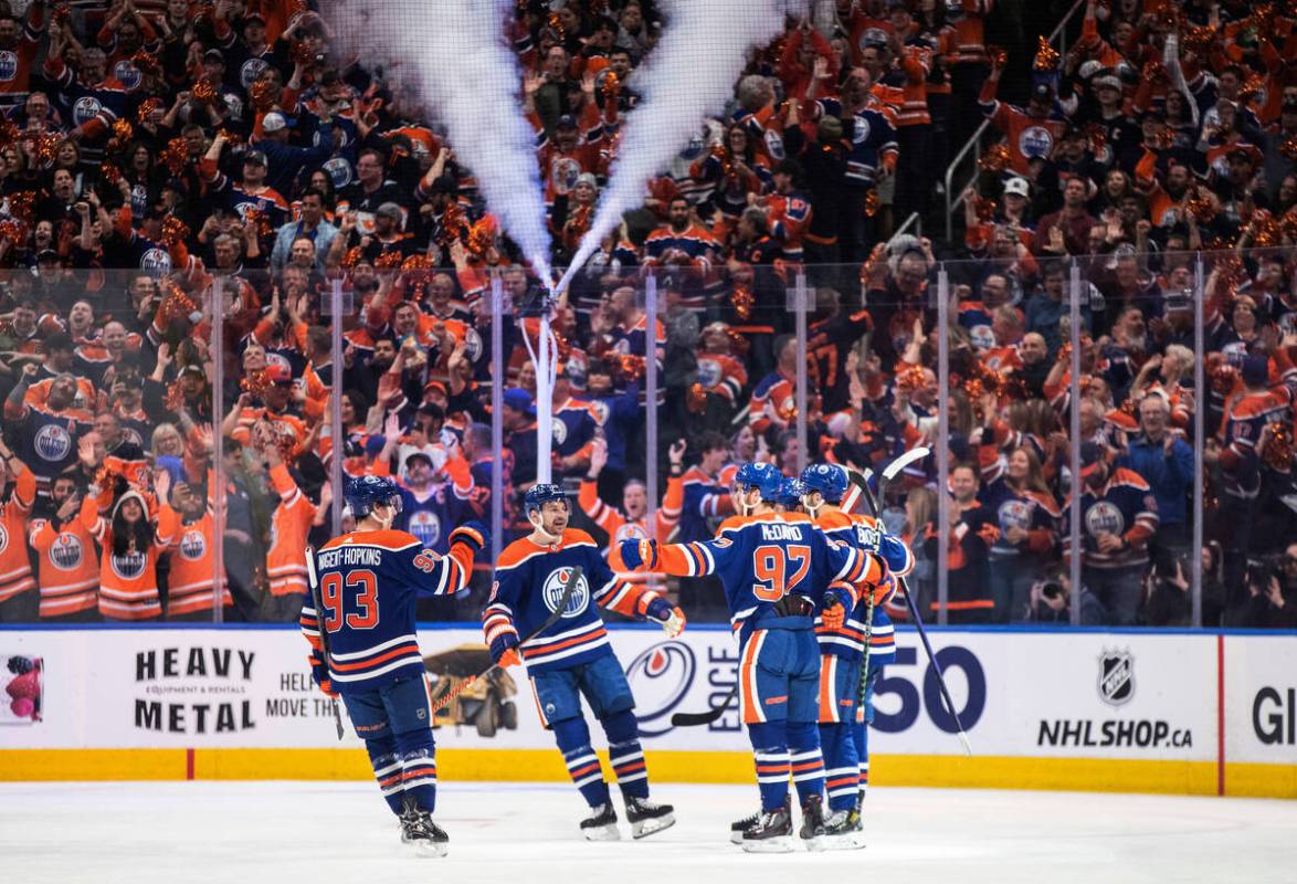 Edmonton Oilers' Ryan Nugent-Hopkins (93), Zach Hyman (18), Connor McDavid (97) and Evan Boucha ...