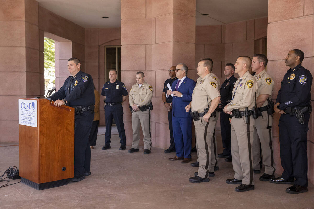 Clark County School District Police Chief Henry Blackeye speaks from the podium during a news c ...