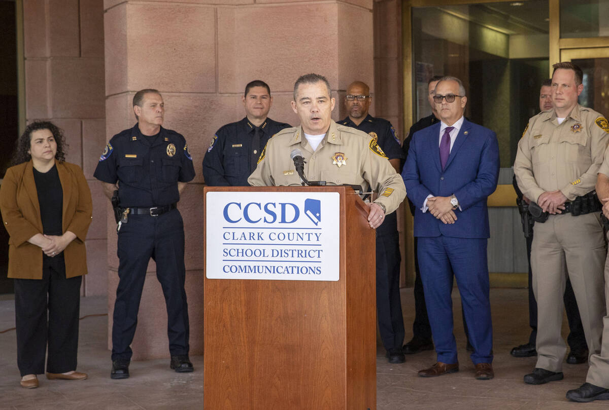 Las Vegas Metropolitan Police Undersheriff Andrew Walsh speaks from the podium with Clark Count ...