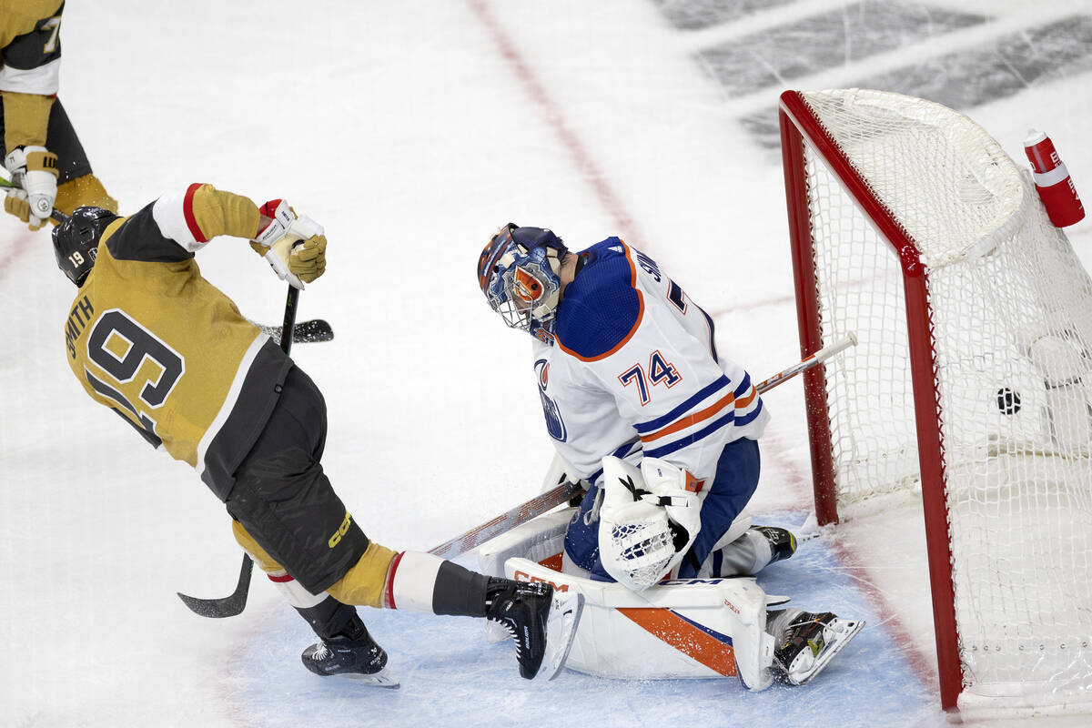 Golden Knights right wing Reilly Smith (19) scores on Edmonton Oilers goaltender Stuart Skinner ...