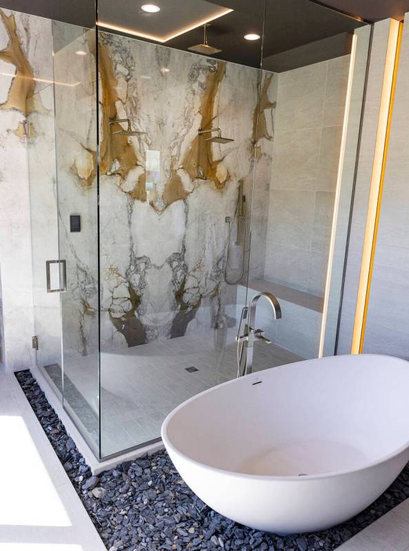 Modern bathtub and a shower are seen in the newly finished house at the Oasi homes, built by Bl ...