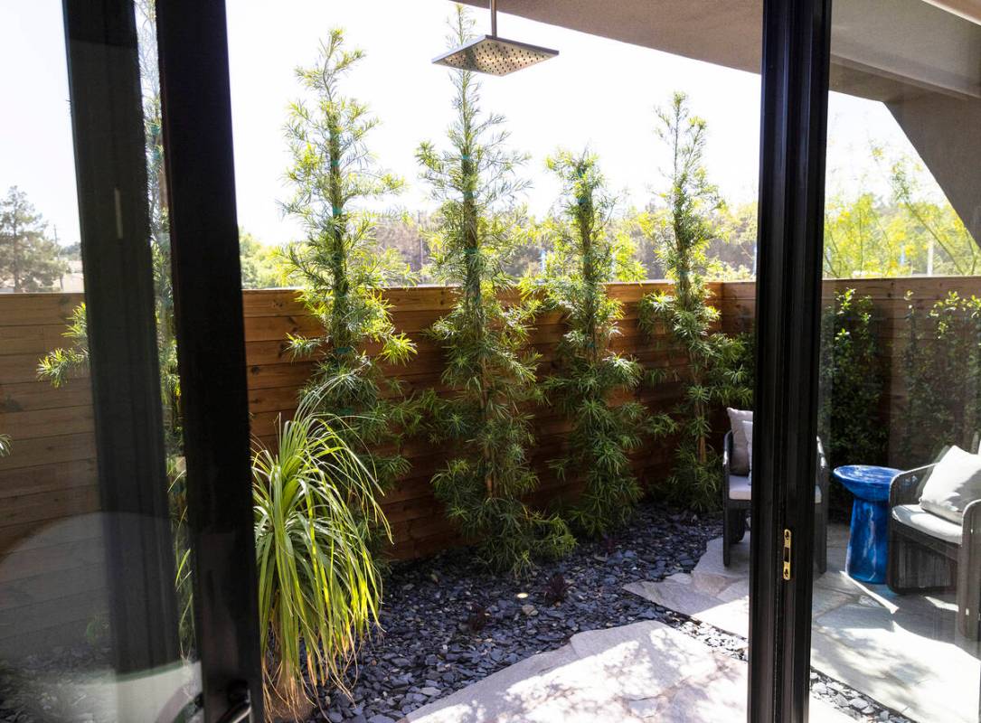 An outdoor shower is seen in the newly finished house at the Oasi homes, built by Blue Heron Ne ...