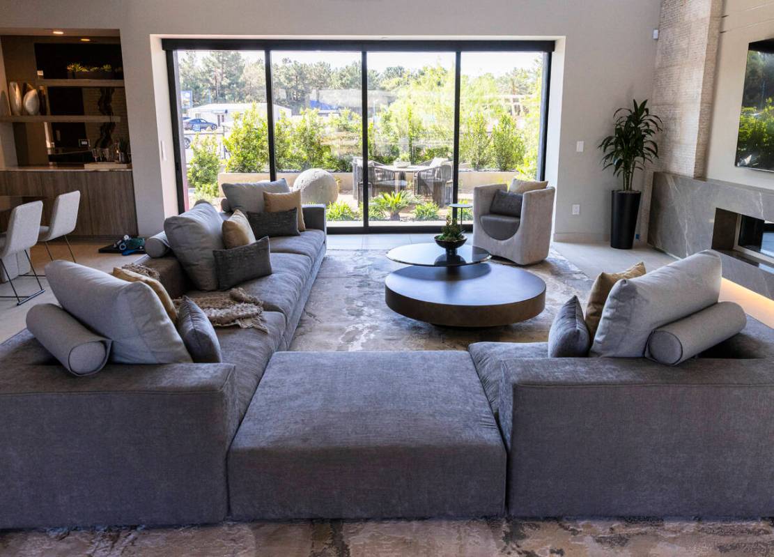 The living room is seen in the newly finished house at the Oasi homes, built by Blue Heron Nexu ...