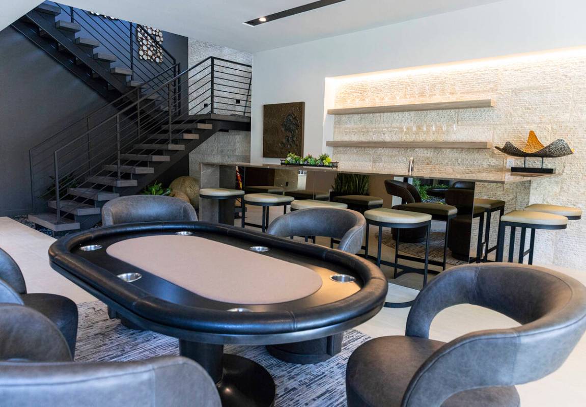 A bar with game table is seen in the newly finished house at the Oasi homes, built by Blue Hero ...