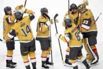 The Golden Knights line up to congratulate goaltender Adin Hill (33) after they won Game 5 of a ...