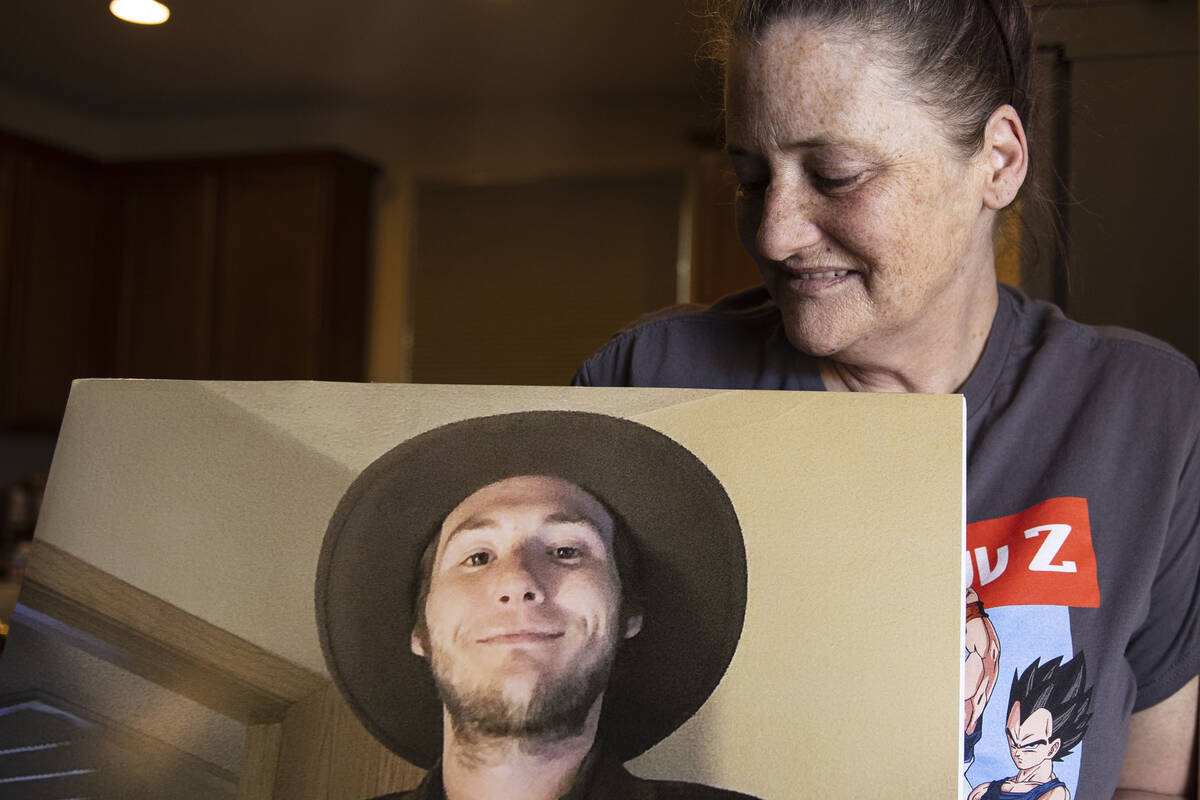 Kassy Robinson holds her son Roy Jaggers' photograph at her Las Vegas home on Saturday, Aug. 21 ...