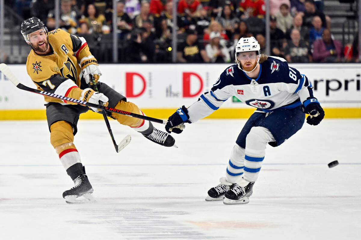 Vegas Golden Knights defenseman Alex Pietrangelo (7) shoots the puck past Winnipeg Jets left wi ...