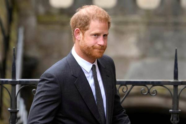FILE - Britain's Prince Harry arrives at the Royal Courts Of Justice in London, Thursday, March ...