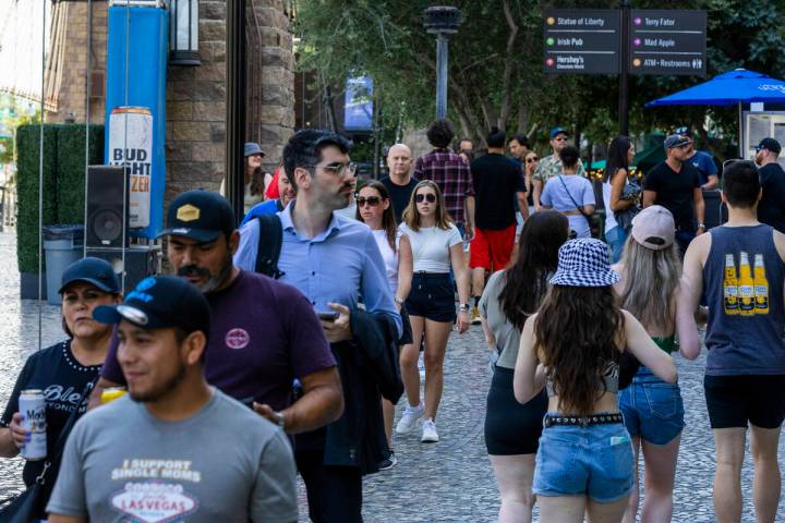 Crowds walk along the Strip on Friday, May 19, 2023, in Las Vegas. (L.E. Baskow/Las Vegas Revie ...