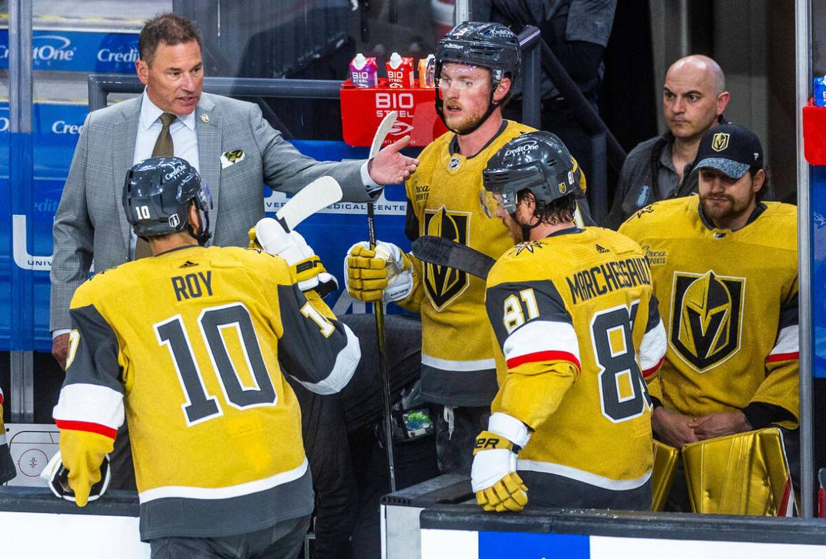 Golden Knights head coach Bruce Cassidy has some words for right wing Jonathan Marchessault (81 ...