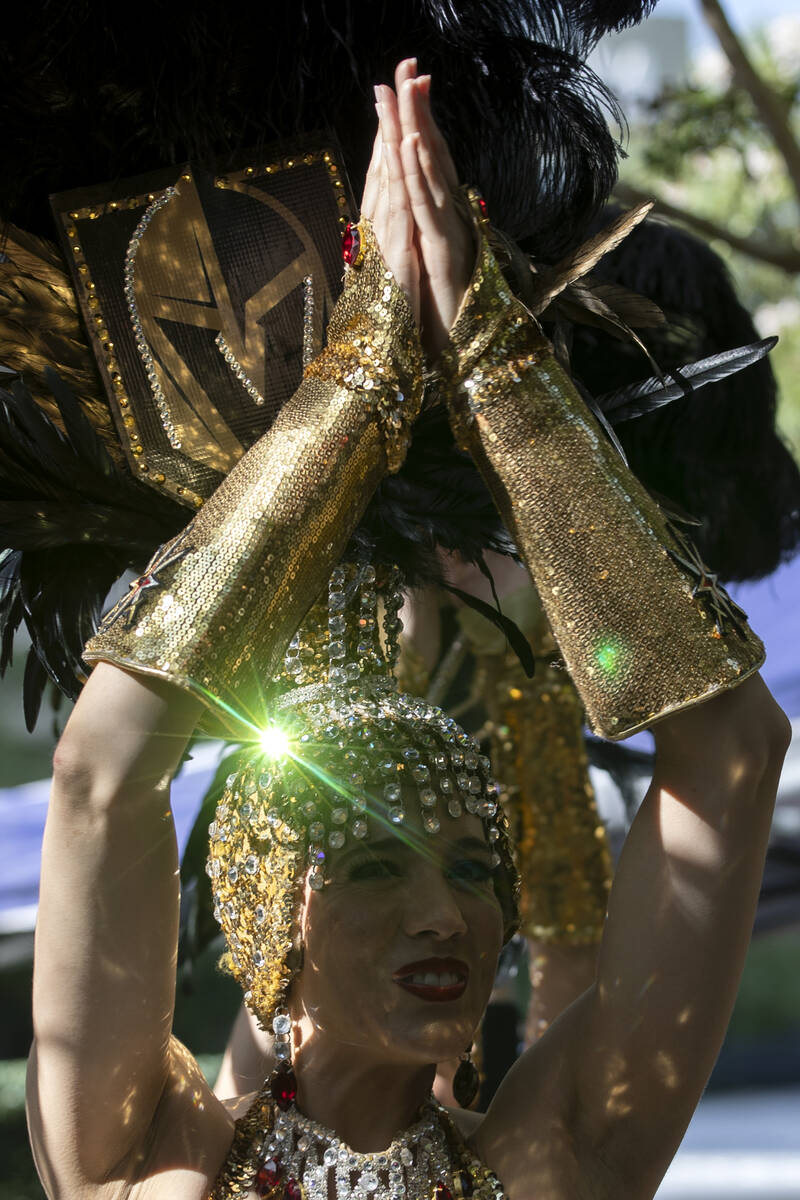 A Vegas Belle parades to T-Mobile Arena before Game 1 of the Western Conference Final playoff s ...