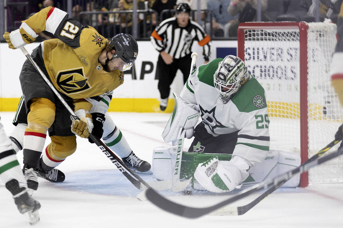 Golden Knights center Brett Howden (21) attempts to score against Dallas Stars goaltender Jake ...