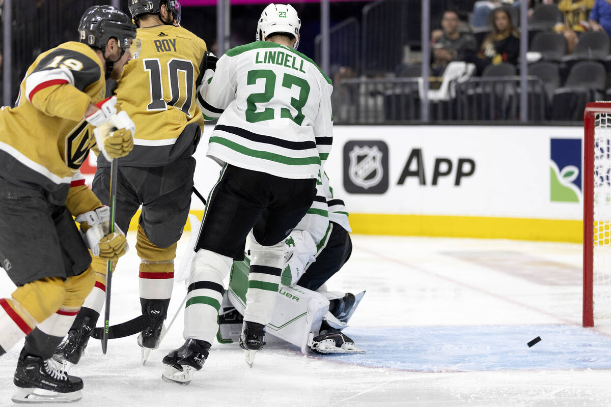 A Golden Knights center William Karlsson, out of frame, shot gets past Dallas Stars goaltender ...