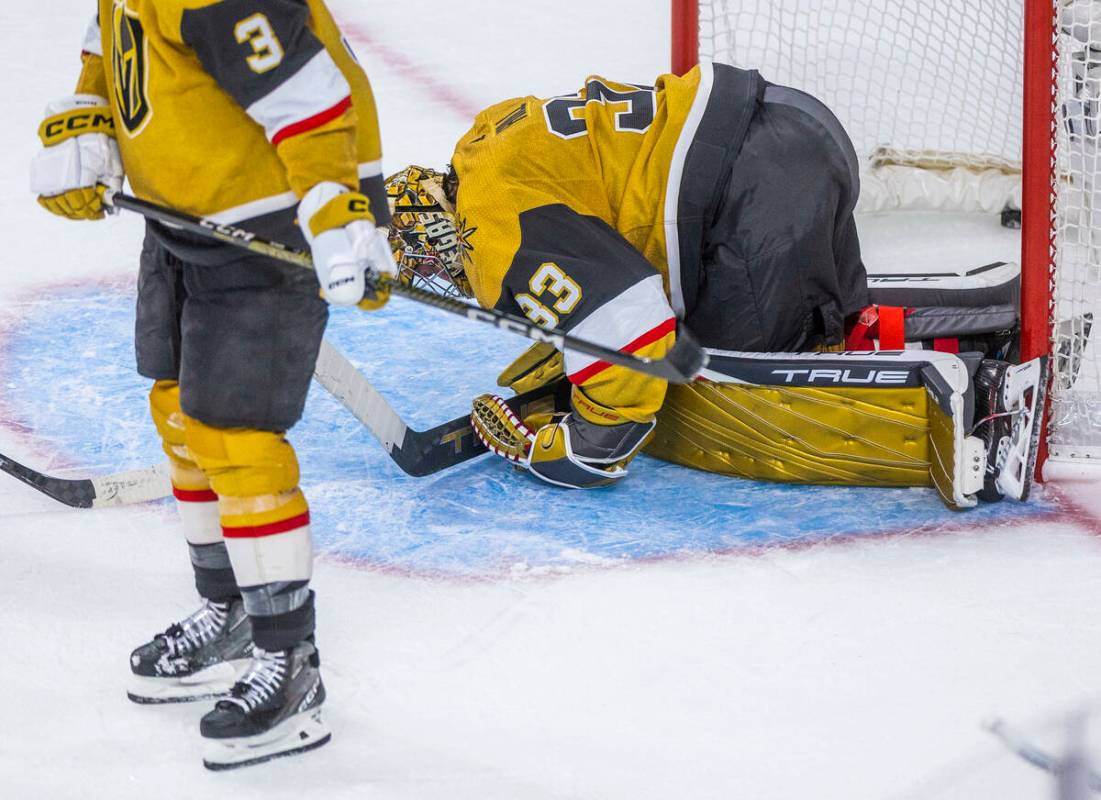 Golden Knights goaltender Adin Hill (33) is dejected after a Dallas Stars tying score during th ...