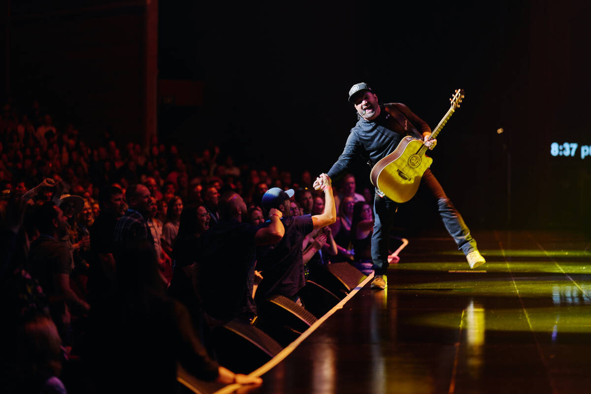 Garth Brooks is shown in his "Garth Brooks/Plus One" opener at the Colosseum at Caesars Palace ...