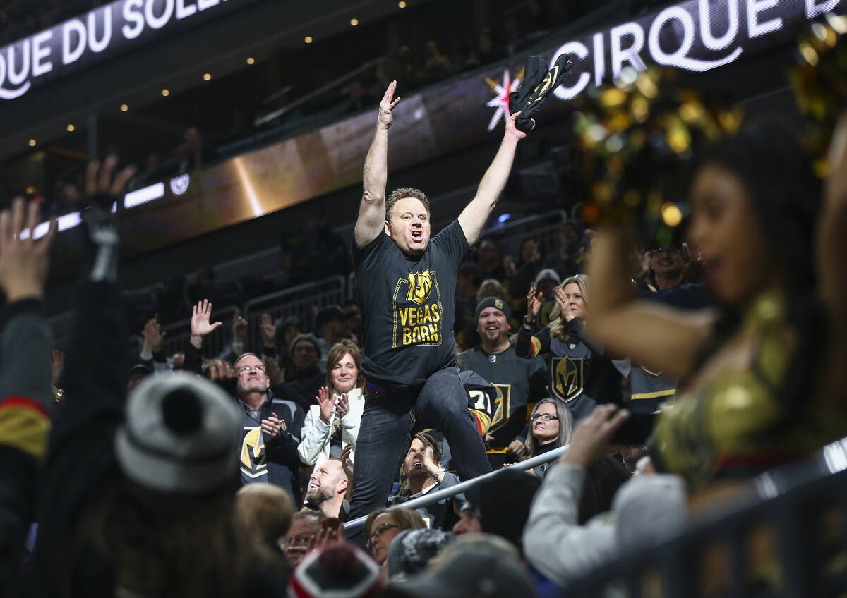 Cameron Hughes entertains fans during a break in the first period of an NHL hockey game against ...