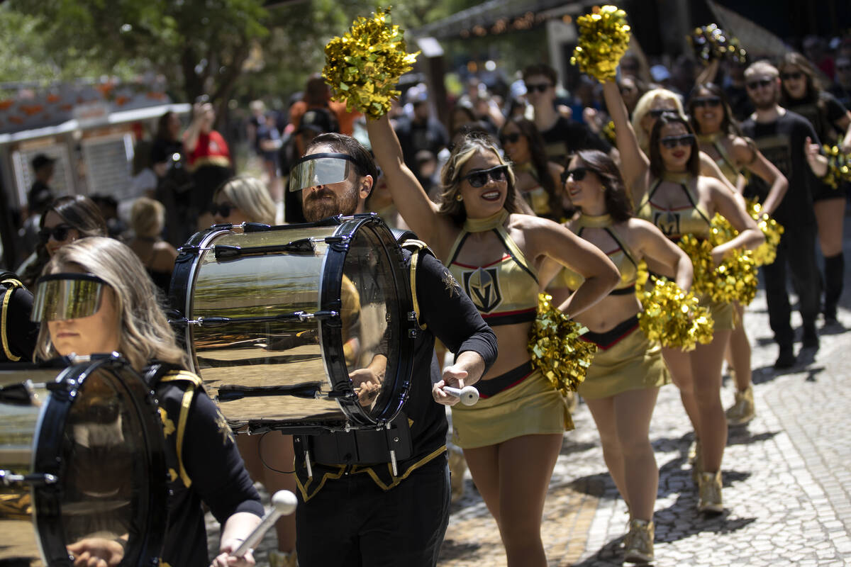 The Golden Knights drumline by Drumbots and the Vegas Vivas parade to T-Mobile Arena before Gam ...