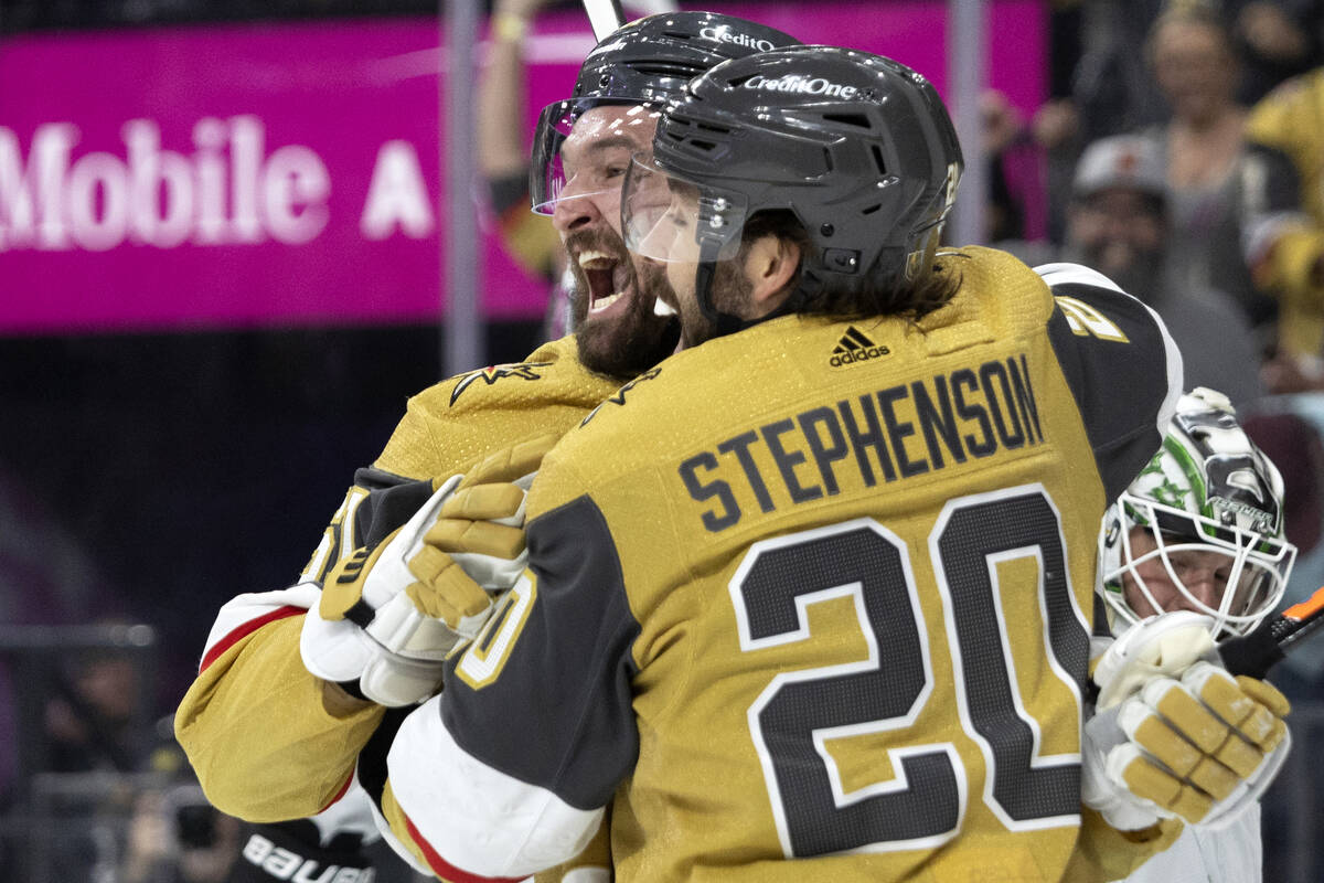 Golden Knights right wing Mark Stone (61) and center Chandler Stephenson (20) celebrate after S ...