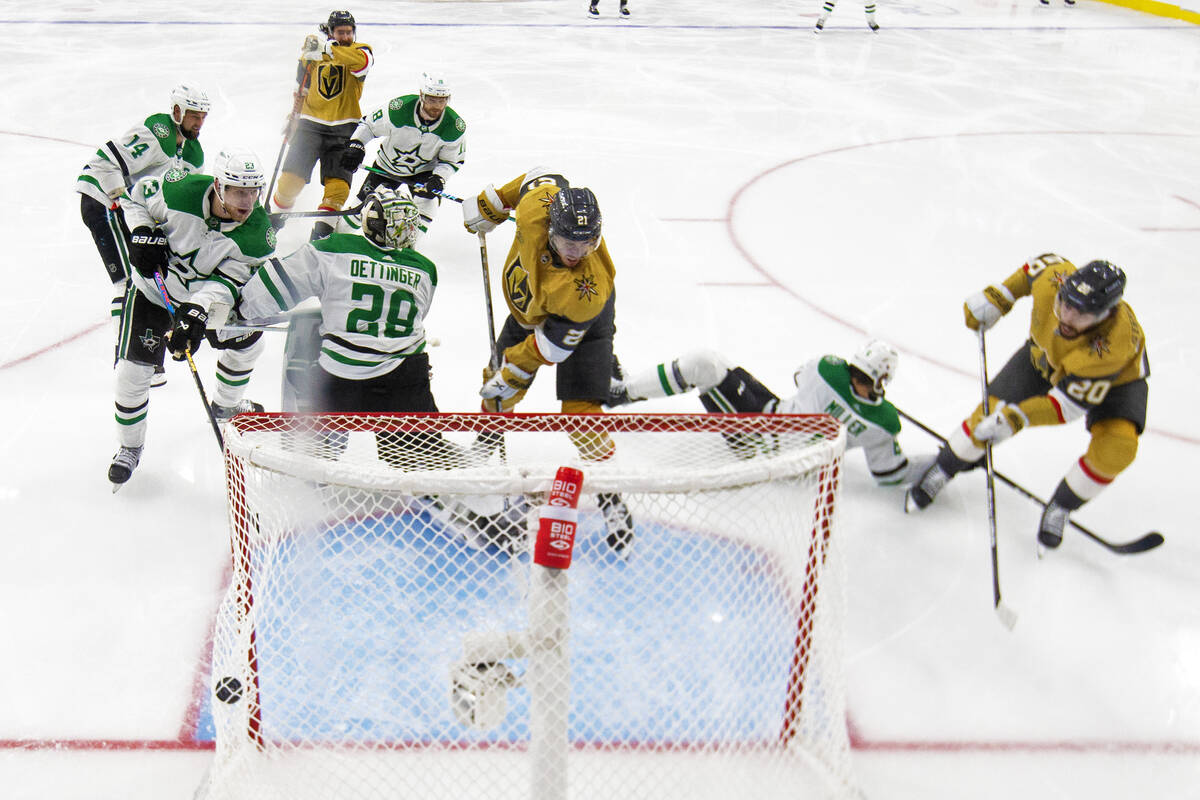 Golden Knights center Chandler Stephenson (20) scores the game-winning goal on Dallas Stars goa ...