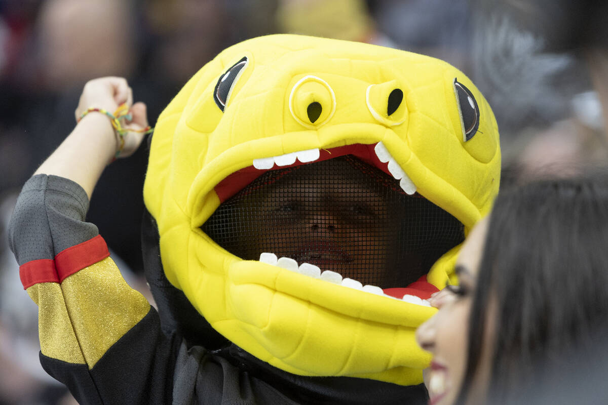 A Golden Knights fan wears a Chance head piece during the third period in Game 2 of the NHL hoc ...