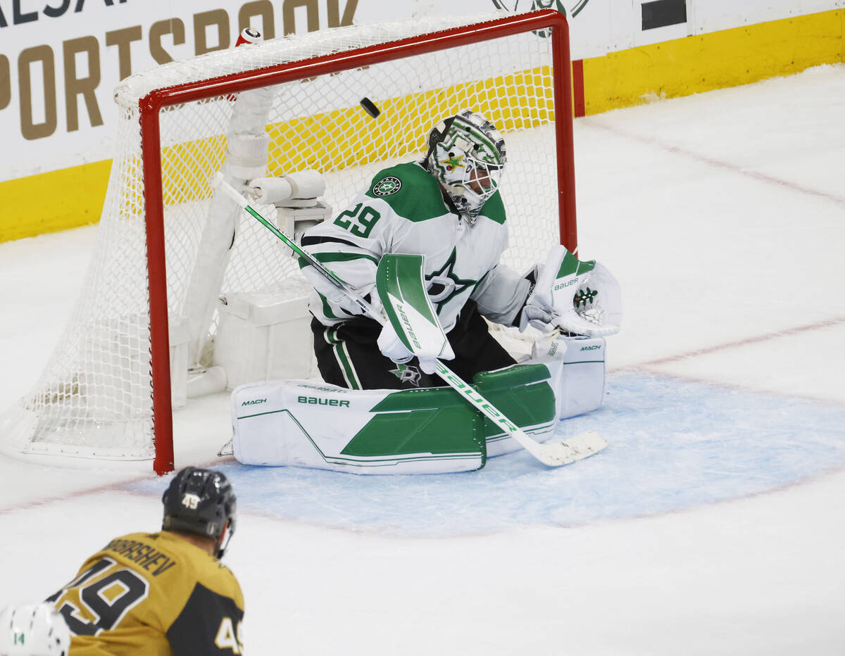 Dallas Stars goaltender Jake Oettinger (29) cannot stop a shot by Golden Knights right wing Jon ...