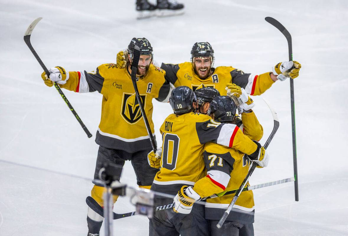 Golden Knights center William Karlsson (71) and teammates celebrate another goal against the Da ...