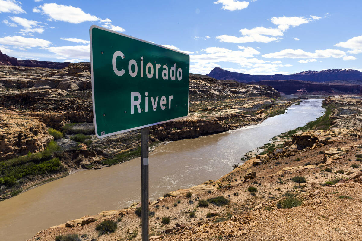 The Colorado River meanders along within the Glen Canyon National Recreation Area about the Hit ...