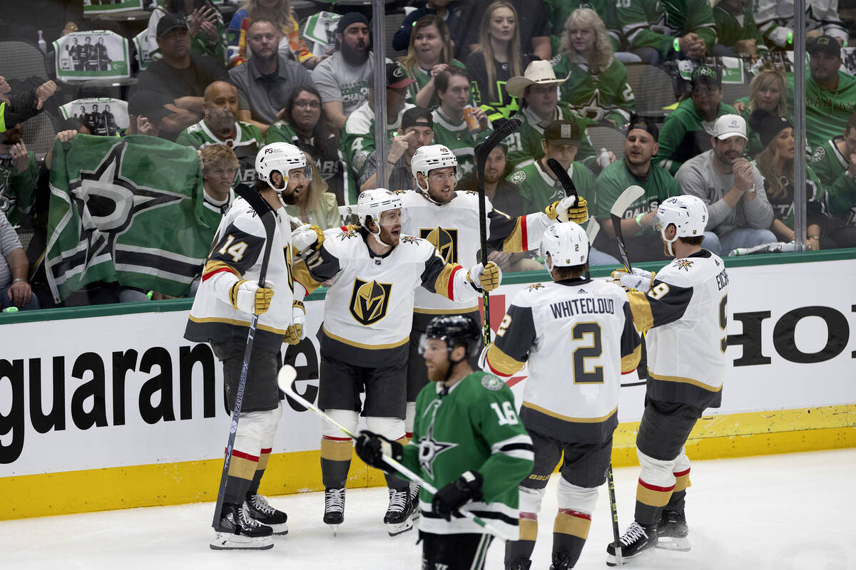 The Golden Knights celebrate after Golden Knights right wing Jonathan Marchessault, second from ...