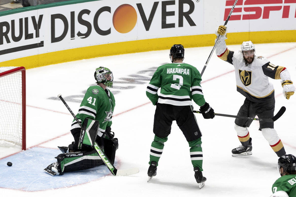 Golden Knights center Nicolas Roy (10) celebrates after defenseman Alex Pietrangelo, out of fra ...