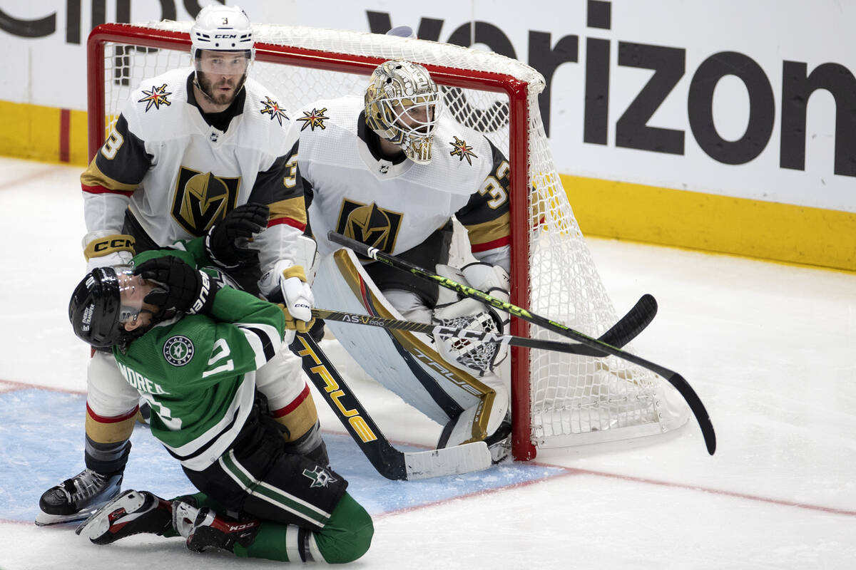 Golden Knights defenseman Brayden McNabb (3) reacts after high-sticking Dallas Stars center Ty ...