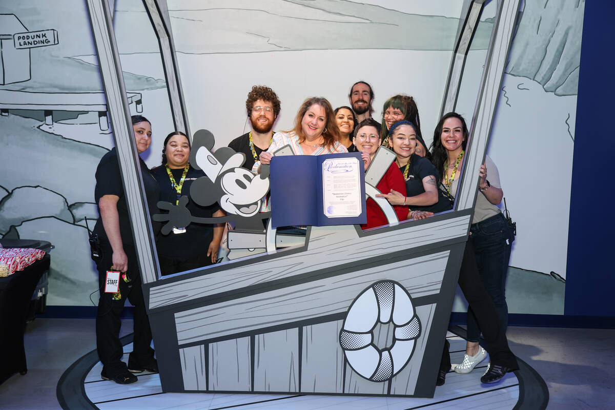 The staff at "Immersive Disney" celebrates the city of Las Vegas announcing May 24, 2023 as "Im ...