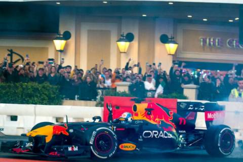 Sergio Pérez turns doughnuts across from the Cromwell during the Formula One Las Vegas Grand P ...