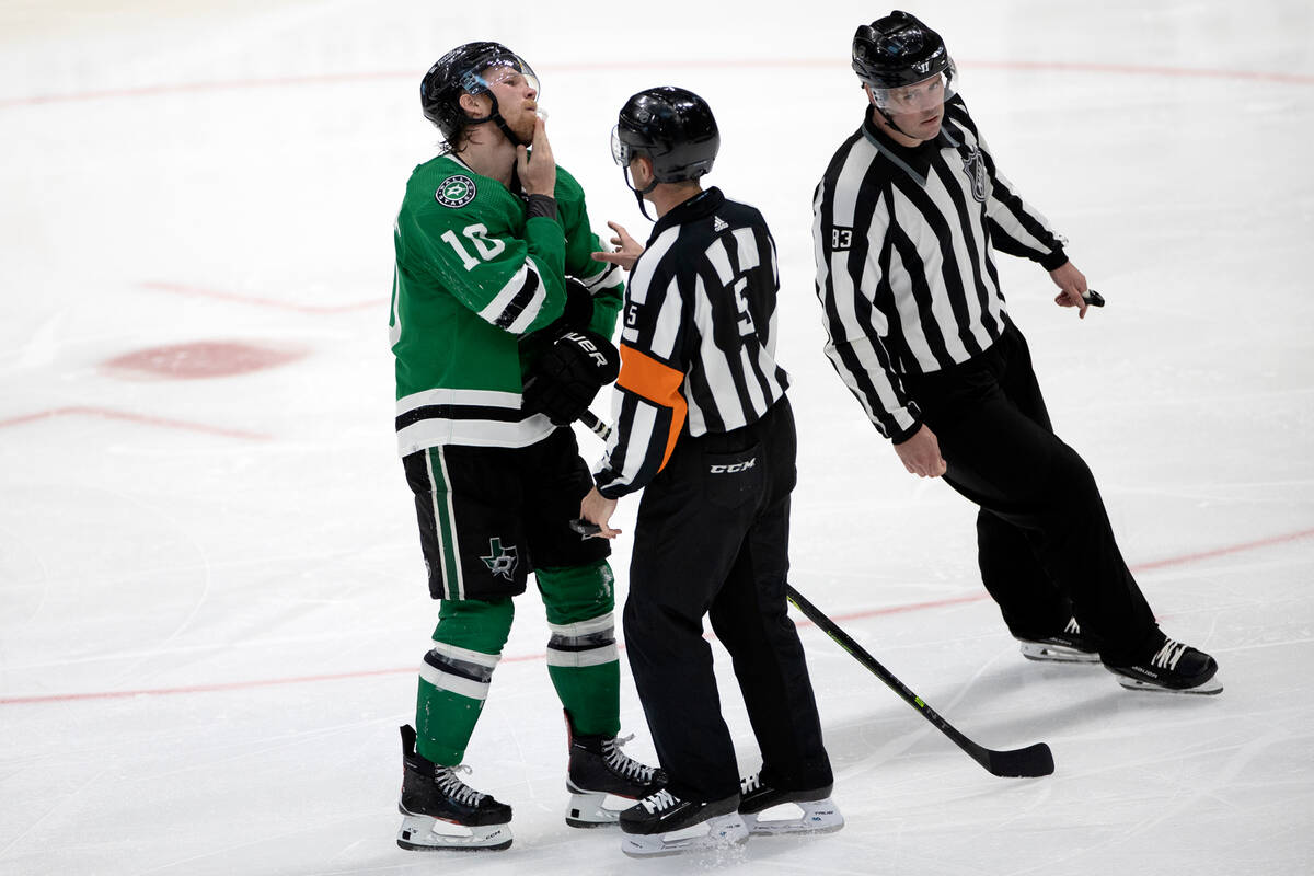 Dallas Stars center Ty Dellandrea (10) shows referees his facial injury after Golden Knights de ...