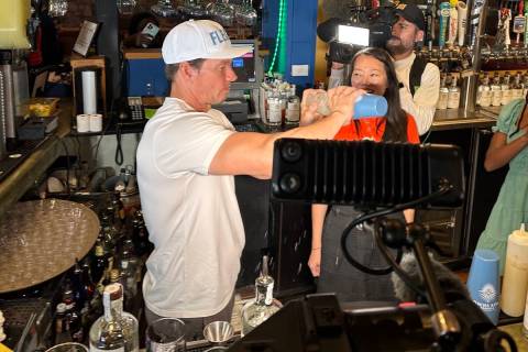 Mark Wahlberg tends bar and pours Flecha Azul tequila shots during an appearance at On The Bord ...